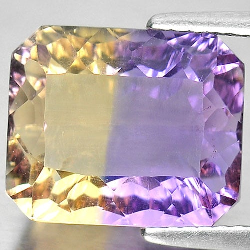 Natural Bi Color Ametrine Gemstones 6.48 Ct. Clean Octagon Millennium Cut 12.2 x 10.3 Mm.: Product ID: 800408024 Product Name: Natural Ametrine Weight: 6.48 CT. Size: 12.2 x 10.3 x 6.6 MM. Shape: Octagon Millennium Cut Color: Bi Color Clarity:IF Luster: Very Good Gems Origin: Bolivia Treatm