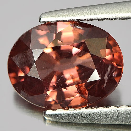 Natural Imperial Pink Zircon Gemstones 2.11 Ct. Oval Shape 8.5 x 6.5 Mm.: Product ID: 807723807 Product Name: Natural Zircon Weight: 2.11 CT. Size: 8.5 x 6.5 x 4 MM. Shape: Oval Color: Imperial Pink Clarity:SI Luster: Good Gems Origin: Tanzania Treatment: Unheated Crystal S