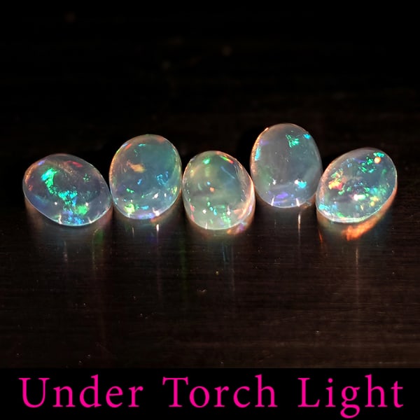 Natural Multi Color Opal 1.29 Ct. 5 Pcs. Oval Cabochon Shape 6 x 4.2 Mm.: Product ID: 818728126 Product Name: Natural Opal Weight: 1.29 CT. Size: 6 x 4.2 x 2.2 MM. Shape: Oval Cabochon Color: Multi-Color Clarity:Semi - Transparent Luster: Good Gems Origin: Ethiopia Treatmen
