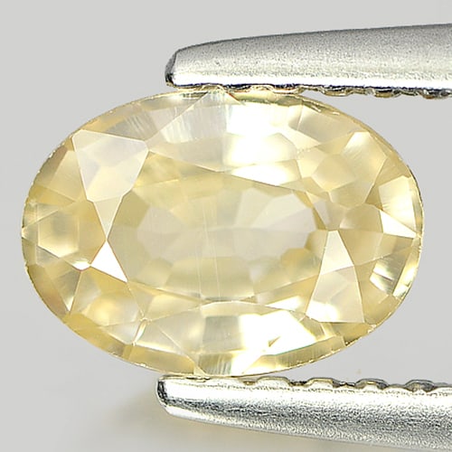 Natural Light Yellow Zircon Gemstones 1.05 Ct. Oval Shape 7 x 5 Mm.: Product ID: 807727202 Product Name: Natural Zircon Weight: 1.05 CT. Size: 7 x 5 x 2.9 MM. Shape: Oval Color: Light Yellow Clarity:VSI Luster: Good Gems Origin: Cambodia Treatment: Heated Crystal Struc