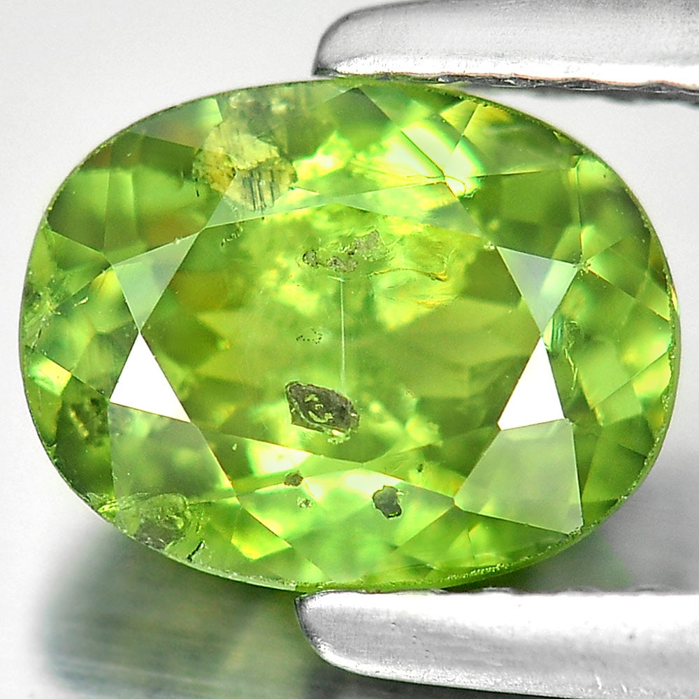 Natural Green Demantoid Garnet Gemstones 1.17 Ct. Oval Shape 7.2 x 5.6 Mm. (1 of 3)