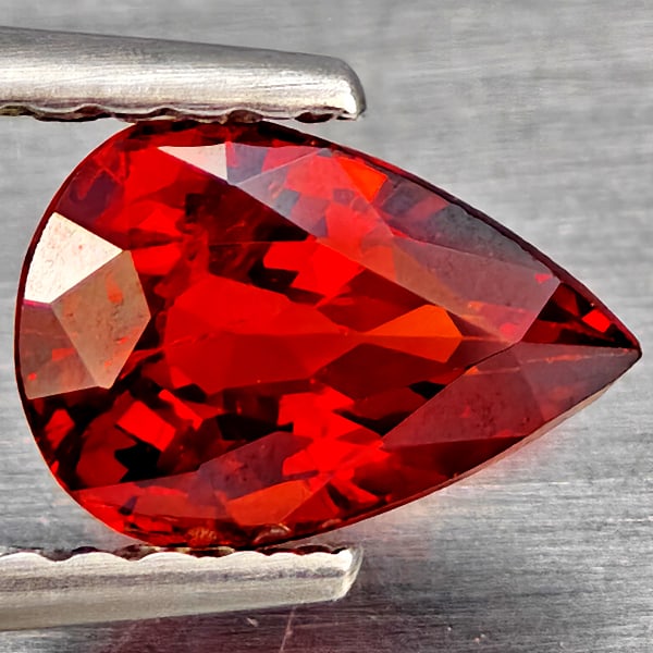 Natural Orangish Red Spessartine Garnet 1.06 Ct. Pear Shape 7.3 x 5.1 Mm.: Product ID: 802937358 Product Name: Natural Garnet Weight: 1.06 CT. Size: 7.3 x 5.1 x 3.5 MM. Shape: Pear Shape Color: Orangish Red Clarity:VSI Luster: Very Good Gems Origin: Namibia Treatment: Unheat