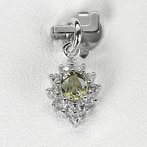 Natural Green Songea Sapphire Gemstones with 925 Sterling Silver Pendant Jewelry 0.78 Grams: Product ID: 202100550 Product Type: 925 Sterling Silver Fine Jewelry Jewelry Weight: 0.78 Grams. Gemstones Color: Green Metal: Solid Silver 92.5%. Gemstone Detail: Center: Oval Green Songea Sapphire S