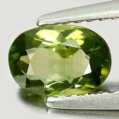 Natural Green Tourmaline Gemstones 0.83 Ct. Oval Shape 7.1 x 4.8 Mm.: Product ID: 807246743 Product Name: Natural Tourmaline Weight: 0.83 CT. Size: 7.1 x 4.8 x 3.4 MM. Shape: Oval Color: Green Clarity:VSI Luster: Good Gems Origin: Nigeria Treatment: Unheated Crystal Str