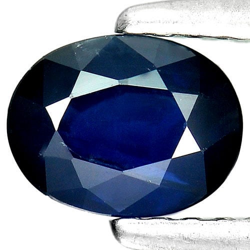 Natural Blue Sapphire Gemstones 0.84 Ct. Oval Shape 6.4 x 5 Mm.: Product ID: 806006420 Product Name: Natural Blue Sapphire Weight: 0.84 CT. Size: 6.4 x 5 x 3 MM. Shape: Oval Color: Blue Clarity:VSI Luster: Good Gems Origin: Thailand Treatment: Heated Crystal Struct