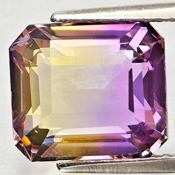 Natural Bi Color Ametrine Gemstones 4.31 Ct. Octagon Shape 10 x 8.9 Mm.: Product ID: 800408271 Product Name: Natural Ametrine Weight: 4.31 CT. Size: 10 x 8.9 x 6.3 MM. Shape: Octagon Color: Bi Color Clarity:VSI - SI1 Luster: Good Gems Origin: Bolivia Treatment: Unheated Cr