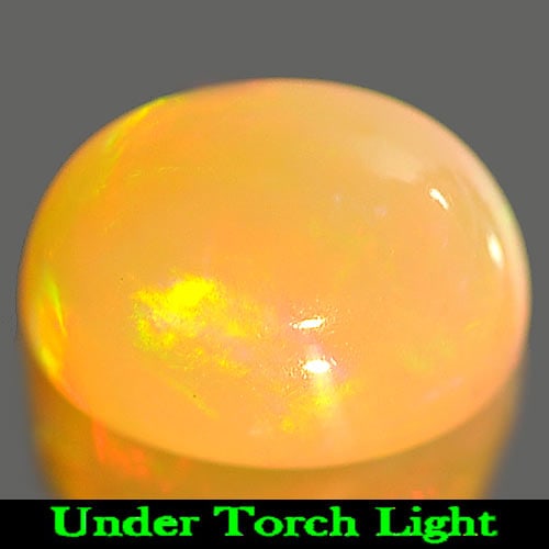 Natural Multi Color Opal Gemstones 1.33 Ct. Oval Cabochon Shape 8.2 x 6.1 Mm.: Product ID: 818725327 Product Name: Natural Opal Weight: 1.33 CT. Size: 8.2 x 6.1 x 5.3 MM. Shape: Oval Cabochon Color: Multi Color Clarity:Semi - Transparent Luster: Iridescent Gems Origin: Ethiopia 