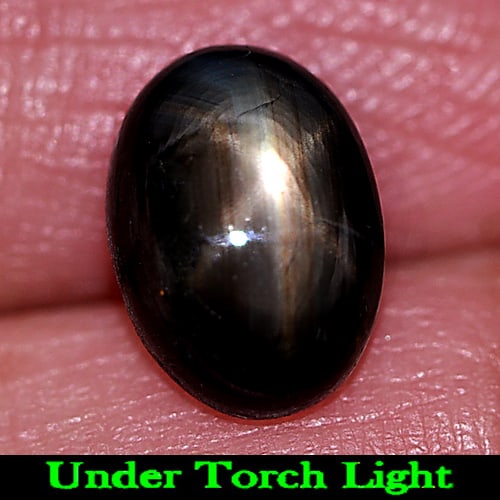 Natural Black Star Sapphire Gemstones 3.23 Ct. Oval Cabochon Shape 9.7 x 7 Mm.: Product ID: 806155198 Product Name: Natural Star Sapphire Weight: 3.23 CT. Size: 9.7 x 7 x 4.1 MM. Shape: Oval Cabochon Color: Black Clarity:Opaque Luster: Good 6 Rays Star Gems Origin: Thailand Treat