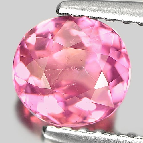 Natural Purplish Pink Tourmaline Gemstones 0.90 Ct. Oval Shape 6.2 x 5.8 Mm.: Product ID: 807226610 Product Name: Natural Tourmaline Weight: 0.90 CT. Size: 6.2 x 5.8 x 3.5 MM. Shape: Oval Color: Purplish Pink Clarity:SI Luster: Good Gems Origin: Nigeria Treatment: Unheated Crys