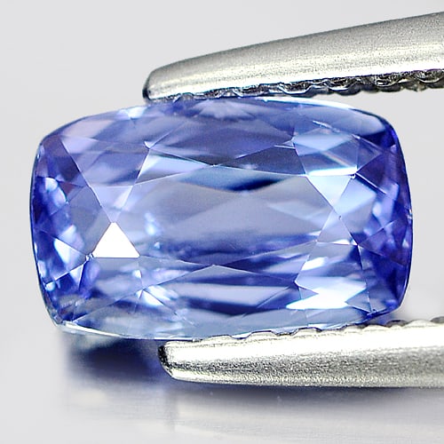 Natural Violetish Blue Tanzanite Gemstones 1.00 Ct. Cushion Shape 7.2 x 4.6 Mm.: Product ID: 807004249 Product Name: Natural Tanzanite Weight: 1.00 CT. Size: 7.2 x 4.6 x 3.5 MM. Shape: Cushion Color: Blue Clarity:VSI Luster: Very Good Gems Origin: Tanzania Treatment: Heated Crysta