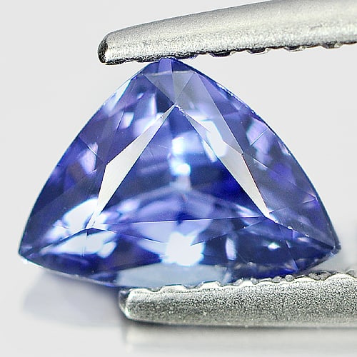 Natural Violet Blue Tanzanite Gemstones 0.79 Ct. Trilliant Shape 7.5 x 5.4 Mm.: Product ID: 807004559 Product Name: Natural Tanzanite Weight: 0.79 CT. Size: 7.5 x 5.4 x 3.5 MM. Shape: Trilliant Color: Violet Blue Clarity:SI Luster: Good Gems Origin: Tanzania Treatment: Heated Cry