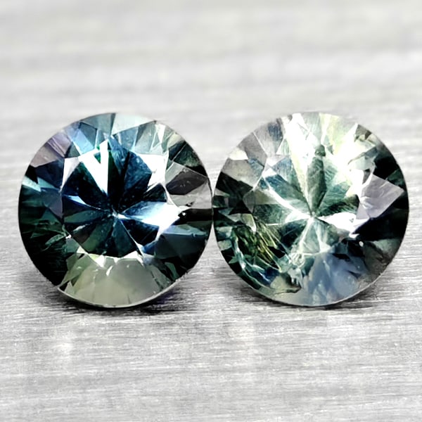Natural Fancy Color Sapphire Gemstones 0.36 Ct. 2 Pcs. Round Diamand Cut 3.2 Mm.: Product ID: 806162246 Product Name: Natural Green Sapphire Weight: 0.36 CT. Size: 3.2 x 3.2 x 2.3 MM. Shape: Round Diamond Cut Color: Fancy Color Clarity:VSI Luster: Very Good Gems Origin: Tanzania Tr