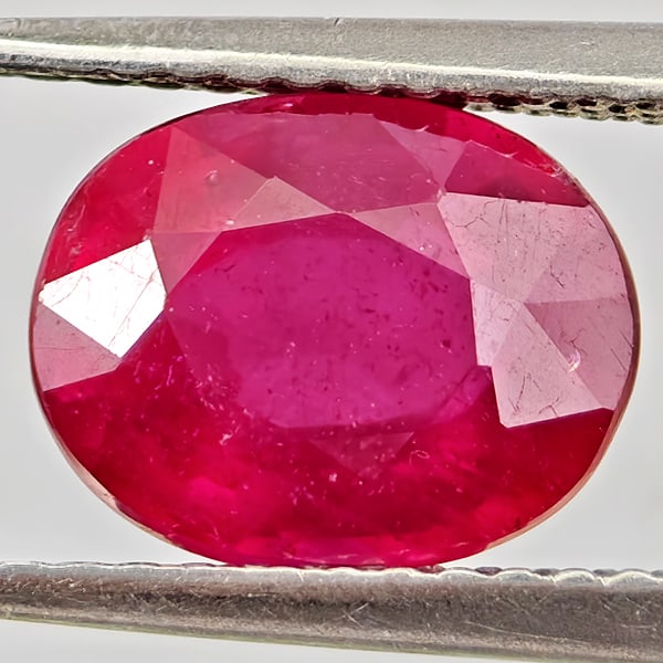 Natural Purplish Red Ruby Gemstones 2.89 Ct. Oval Shape 9 x 7.3 Mm.: Product ID: 805935559 Product Name: Natural Ruby Weight: 2.89 CT. Size: 9 x 7.3 x 4.8 MM. Shape: Oval Color: Purplish Red Clarity:VSI Luster: Good Gems Origin: Madagascar Treatment: Heated (Lead-glass
