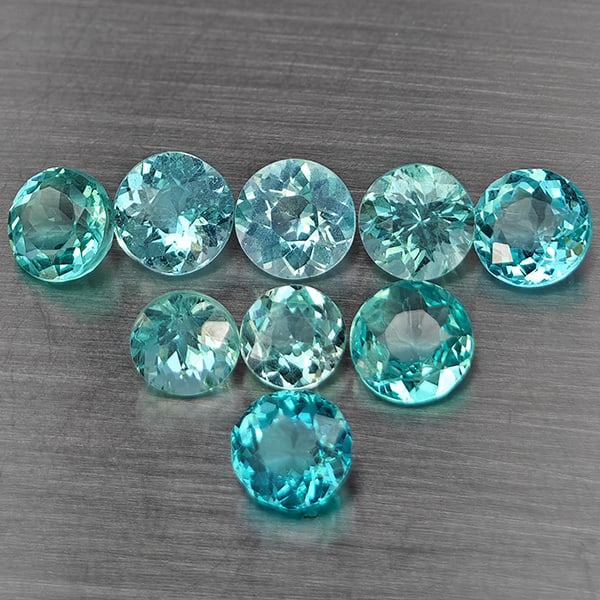 Natural Paraiba Color Apatite Gemstones 3.83 Ct. 9 Pcs. Round Shape 4.9 Mm.: Product ID: 800613743 Product Name: Natural Apatite Weight: 3.83 CT. Size: 4.9 x 4.9 x 3.1 MM. Shape: Round Color: Paraiba Color Clarity:SI1 Luster: Good Gems Origin: Tanzania Treatment: Unheated Crys