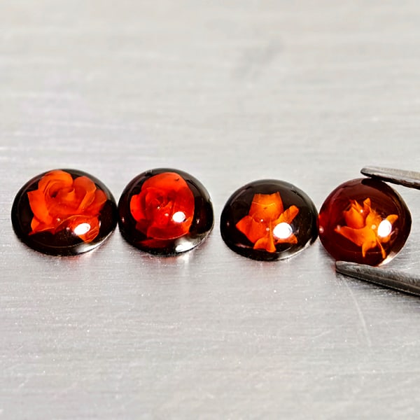 Natural Brown Yellow Amber Gemstones 1.28 Ct. 4 Pcs. Flower Carving In Round Cabochon Shape Mixed: Product ID: 819091055 Product Name: Natural Amber Weight: 1.28 CT. Size: 7.3 x 7.3 x 2.5 to 6.3 x 6.3 x 2 MM. Shape: Round Cabochon Color: Brown Yellow Clarity:Semi - Transparent Luster: Good Gems Ori
