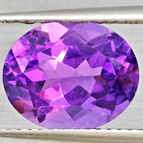 Natural Purple Amethyst Gemstones 3.56 Ct. Oval Shape 11 x 9 Mm.: Product ID: 800325526 Product Name: Natural Amethyst Weight: 3.56 CT. Size: 11 x 9 x 6.5 MM. Shape: Oval Color: Purple Clarity:VSI Luster: Good Gems Origin: Brazil Treatment: Unheated Crystal Structur