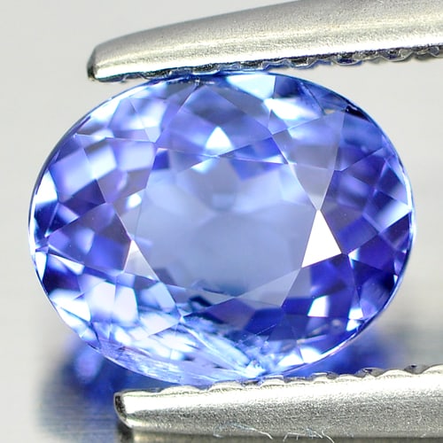 Natural Violet Blue Tanzanite Gemstones 1.00 Ct. Oval Shape 6.8 x 5.6 Mm.: Product ID: 807005342 Product Name: Natural Tanzanite Weight: 1.00 CT. Size: 6.8 x 5.6 x 3.6 MM. Shape: Oval Color: Purple Clarity:SI Luster: Good Gems Origin: Tanzania Treatment: Heated Crystal Struc