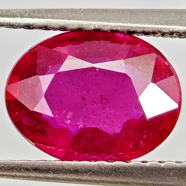 Natural Purplish Red Ruby Gemstones 2.06 Ct. Oval Shape 9 x 6.9 Mm.: Product ID: 805935557 Product Name: Natural Ruby Weight: 2.06 CT. Size: 9 x 6.9 x 3.6 MM. Shape: Oval Color: Purplish Red Clarity:VSI Luster: Good Gems Origin: Madagascar Treatment: Heated (Lead-glass