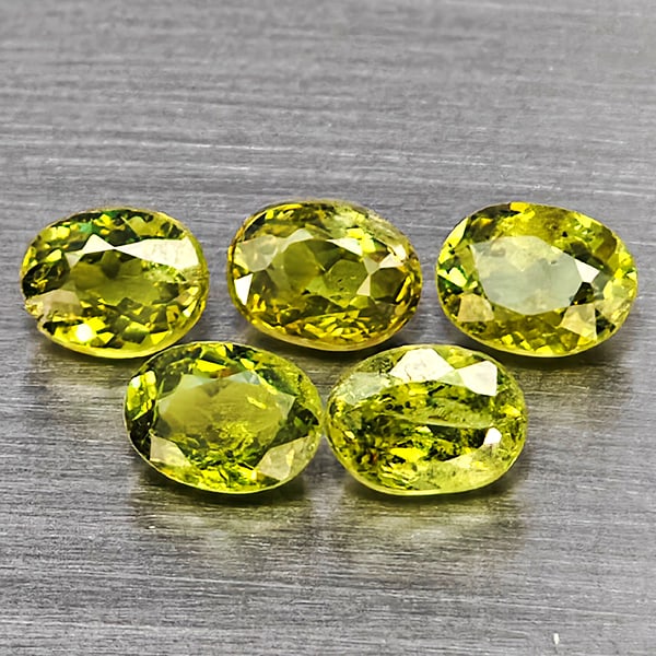 Natural Green Demantiod Garnet Gemstones 1.20 Ct. 5 Pcs. Oval Shape 4.4 x 4 Mm.: Product ID: 802937584 Product Name: Natural Demantoid Weight: 1.20 CT. Size: 4.4 x 4 x 2.3 MM. Shape: Oval Color: Green Clarity:SI1 Luster: Good Gems Origin: Madagascar Treatment: Unheated Crystal Str