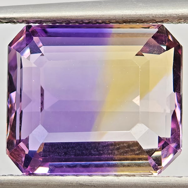 Natural Bi Color Ametrine Gemstones 5.47 Ct. Octagon Shape 11.1 x 9.6 Mm.: Product ID: 800408604 Product Name: Natural Ametrine Weight: 5.47 CT. Size: 11.1 x 9.6 x 6.3 MM. Shape: Octagon Color: Bi Color Clarity:VVS Luster: Good Gems Origin: Bolivia Treatment: Unheated Crysta