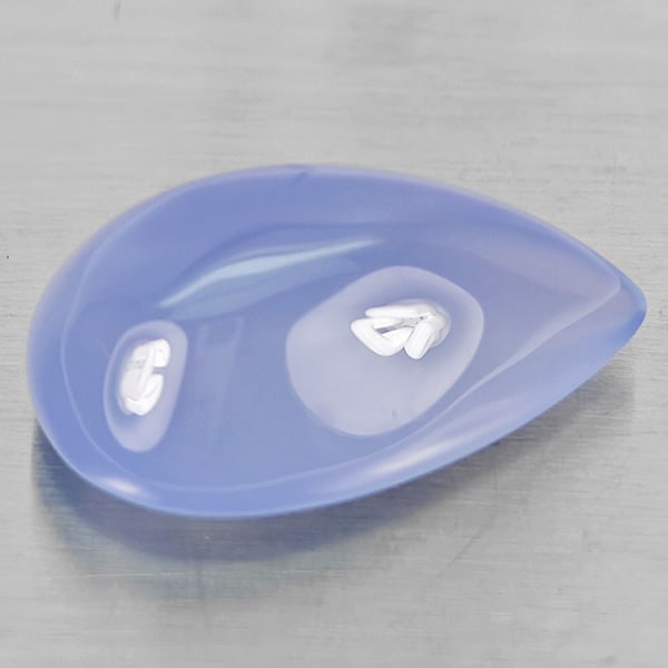 Natural Lavender Chalcedony Gemstones 25.88 Ct. Pear Cabochon Shape 25 x 15.8 Mm.: Product ID: 801502706 Product Name: Natural Chalcedony Weight: 25.88 CT. Size: 25 x 15.8 x 11.4 MM. Shape: Pear Cabochon Color: Lavender Clarity:Semi - Transparent Luster: Good Gems Origin: Russia Tre