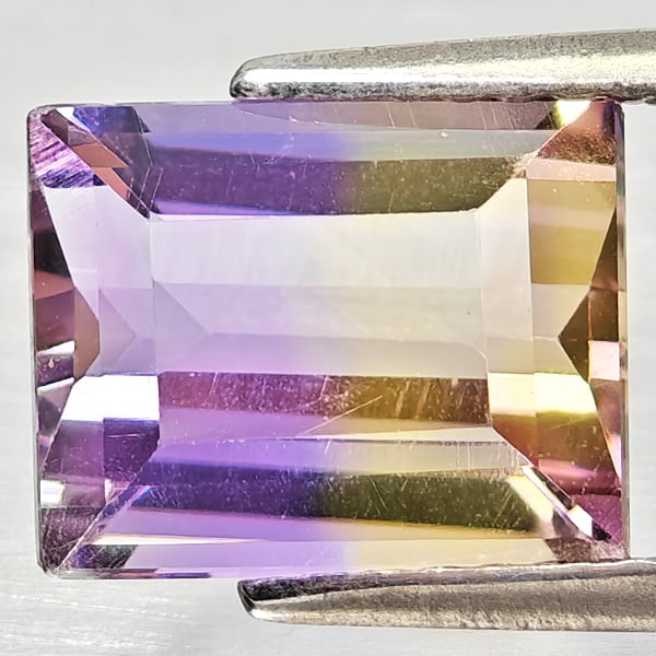 Natural Bi Color Ametrine Gemstones 2.68 Ct. Octagon Shape 9.3 x 7.4 Mm.: Product ID: 800408381 Product Name: Natural Ametrine Weight: 2.68 CT. Size: 9.3 x 7.4 x 5.1 MM. Shape: Octagon Color: Bi Color Clarity:VSI - SI1 Luster: Good Gems Origin: Bolivia Treatment: Unheated C