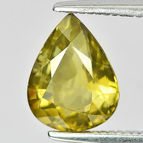 Natural Greenish Yellow Chrysoberyl Gemstones 1.61 Ct. Pear Shape 9 x 7 Mm.: Product ID: 801701105 Product Name: Natural Chrysoberyl Weight: 1.61 CT. Size: 9 x 7 x 4.4 MM. Shape: Pear Color: Yellow Clarity:VSI Luster: Good Gems Origin: Madagascar Treatment: Unheated Crystal St