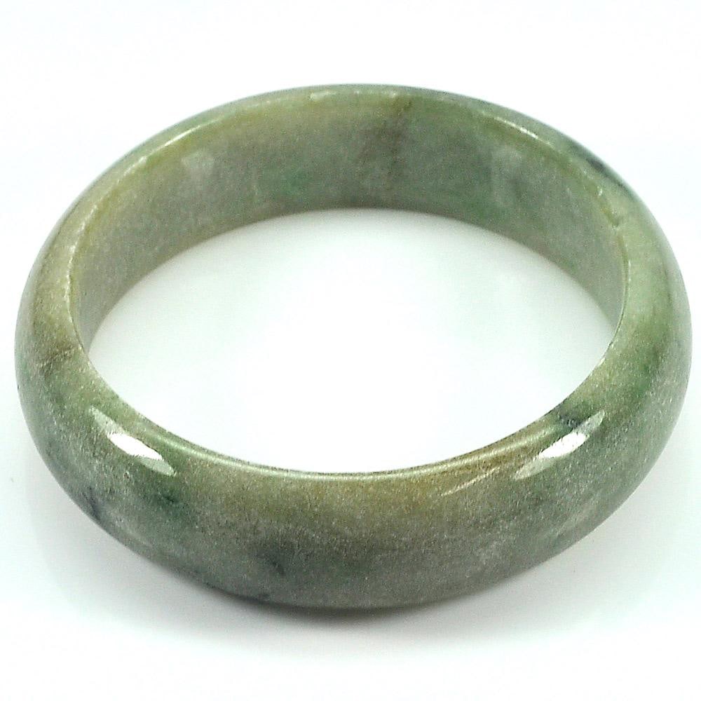 Natural Green Jade Gemstones Bangle 319.13 Ct. Diameter 55 Mm.: Product ID: 819808049 Product Name: Natural Jade Weight: 319.13 CT. Size: 70 / 55 / 17 MM. Shape: Round Color: Green Clarity:Opaque Luster: Good Gems Origin: Thailand Treatment: Unheated Crystal Struc