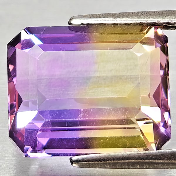 Natural Bi Color Ametrine Gemstones 4.43 Ct. Octagon Shape 10.9 x 8.9 Mm.: Product ID: 800408309 Product Name: Natural Ametrine Weight: 4.43 CT. Size: 10.9 x 8.9 x 5.9 MM. Shape: Octagon Color: Bi Color Clarity:VSI Luster: Good Gems Origin: Bolivia Treatment: Unheated Crysta