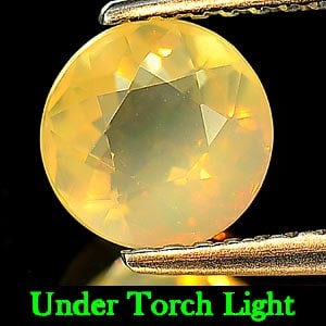 Natural Multi Color Opal Gemstones 0.87 Ct. Round Shape 6.5 Mm.: Product ID: 818709666 Product Name: Natural Opal Weight: 0.87 CT. Size: 6.5 x 6.5 x 4.8 MM. Shape: Round Color: Multi Color Clarity:Semi - Transparent Luster: Good Gems Origin: Ethiopia Treatment: Unh