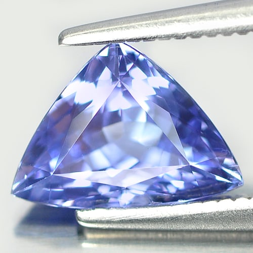 Natural Violetish Blue Tanzanite Gemstones 1.29 Ct. Trilliant Shape 9 x 6.5 Mm.: Product ID: 807006349 Product Name: Natural Tanzanite Weight: 1.29 CT. Size: 9 x 6.5 x 4.1 MM. Shape: Trilliant Color: Blue Clarity:VSI Luster: Good Gems Origin: Tanzania Treatment: Heated Crystal Str