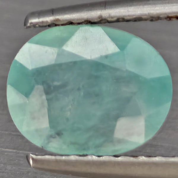 Natural Green Blueish Grandidierite Gemstones 1.51 Ct. Oval Shape 8.4 x 6.8 Mm.: Product ID: 803100122 Product Name: Natural Tsavorite Weight: 1.51 CT. Size: 8 x 5.9 x 4.4 MM. Shape: Oval Shape Color: Green Blueish Clarity:SI1 Luster: Good Gems Origin: Madagascar Treatment: Unheat