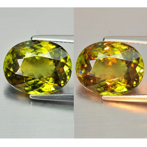Natural Multi-Color Sphene With Rainbow Spark 6.90 Ct. Oval Shape 13.4 x 10.7 Mm.: Product ID: 806507995 Product Name: Natural Sphene Weight: 6.90 CT. Size: 13.4 x 10.7 x 6.3 MM. Shape: Oval Color: Multi-Color With Rainbow Spark Clarity:VSI Luster: Adamantine Gems Origin: Madagascar