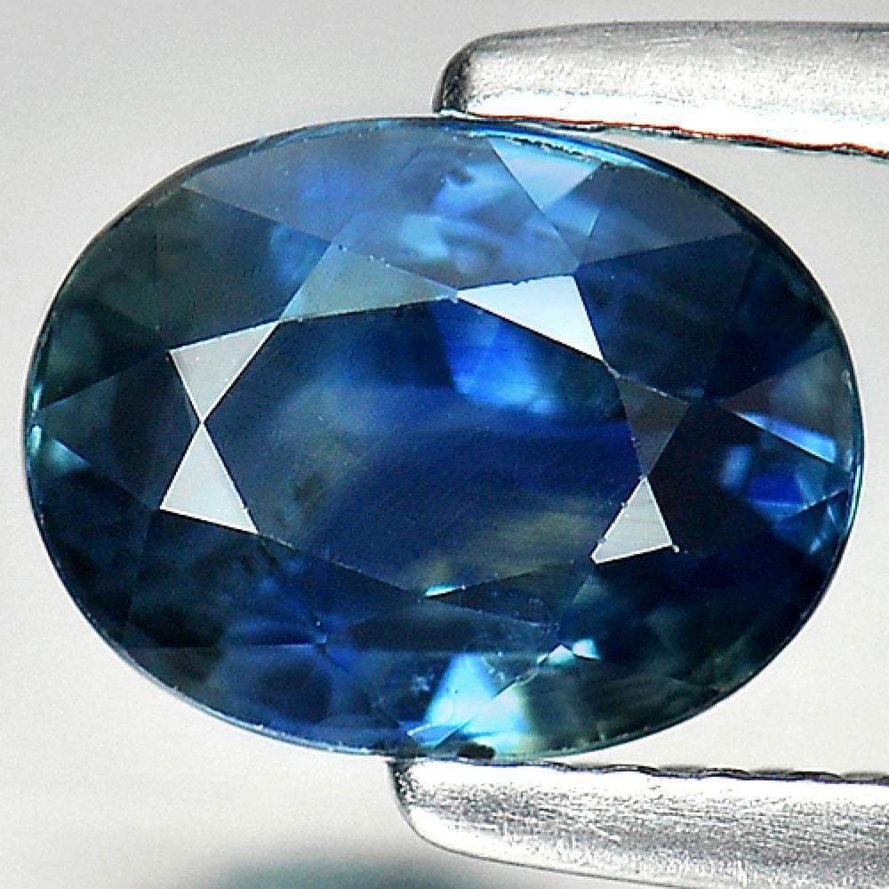 Natural Greenish Blue Sapphire Gemstones 1.87 Ct. Oval Shape 7.9 x 6 Mm.: Product ID: 806008815 Product Name: Natural Blue Sapphire Weight: 1.87 CT. Size: 7.9 x 6 x 4.2 MM. Shape: Oval Color: Blue Clarity:VSI Luster: Very Good Gems Origin: Thailand Treatment: Heated Crystal