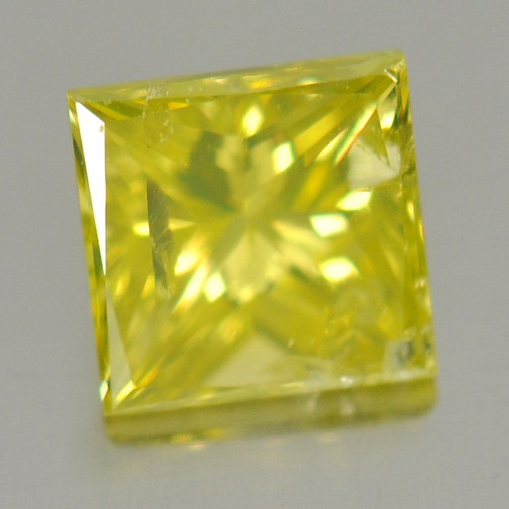 Natural Yellow Loose Diamond 0.19 Ct. Square Princess Cut 3 x 3 Mm.: Product ID: 802103791 Product Name: Natural Enhanced Diamond Weight: 0.19 CT. Size: 3 x 3 x 2.2 MM. Shape: Square Princess Cut Color: Yellow Clarity:SI1 Luster: Good Gems Origin: Belgium Treatment: Tr