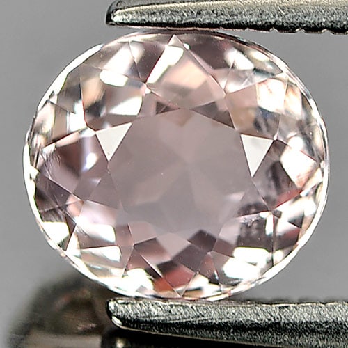Natural Pink Tourmaline Gemstones 1.21 Ct. Oval Shape 7 x 6.3 Mm.: Product ID: 807244119 Product Name: Natural Tourmaline Weight: 1.21 CT. Size: 7 x 6.3 x 4.1 MM. Shape: Oval Color: Pink Clarity:VSI Luster: Good Gems Origin: Nigeria Treatment: Unheated Crystal Struct