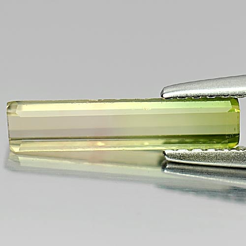 Natural Bi Color Tourmaline Gemstones 0.86 Ct. Octagon Shape 13.6 x 3 Mm.: Product ID: 807241120 Product Name: Natural Tourmaline Weight: 0.86 CT. Size: 13.6 x 3 x 2 MM. Shape: Octagon Color: Bi Color Clarity:VSI Luster: Good Gems Origin: Nigeria Treatment: Unheated Crystal 