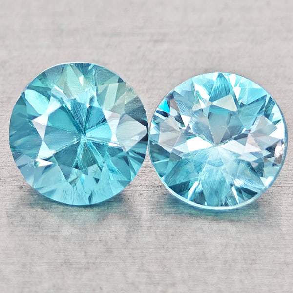 Natural Blue Zircon Gemstones 1.28 Ct. 2 Pcs. Round Diamond Cut 5 Mm.: Product ID: 807743046 Product Name: Natural Zircon Weight: 1.28 CT. Size: 5 x 5 x 3.5 MM. Shape: Round Diamond Cut Color: Blue Clarity:VSI Luster: Good Gems Origin: Cambodia Treatment: Heated Crystal 