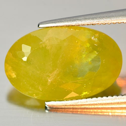 Natural Green Sphene Gemstones 4.95 Ct. Oval Shape 13.7 x 8.7 Mm.: Product ID: 806504598 Product Name: Natural Sphene Weight: 4.95 CT. Size: 13.7 x 8.7 x 5.1 MM. Shape: Oval Color: Intense Green With Red Spark Clarity:VSI - SI Luster: Adamantine Gems Origin: Madagasc