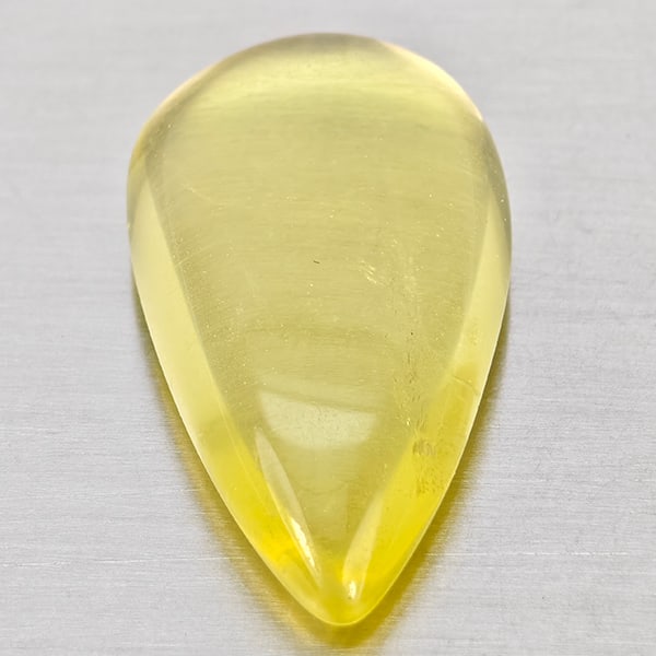 Natural Yellow Lemon Quartz Gemstones 14.34 Ct. Pear Cabochon Shape 24 x 13 Mm.: Product ID: 805530055 Product Name: Natural Quartz Weight: 14.34 CT. Size: 24 x 13 x 6.5 MM. Shape: Pear Cabochon Color: Yellow Clarity:None Luster: Good Gems Origin: Brazil Treatment: Unheated Crysta