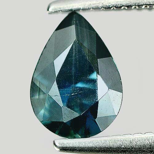 Natural Blue Sapphire Gemstones 0.79 Ct. Pear Shape 7.3 x 5.3 Mm.: Product ID: 806155937 Product Name: Natural Blue Sapphire Weight: 0.79 CT. Size: 7.3 x 5.3 x 3.4 MM. Shape: Pear Color: Blue Clarity:VSI Luster: Good Gems Origin: Thailand Treatment: Heated Crystal St
