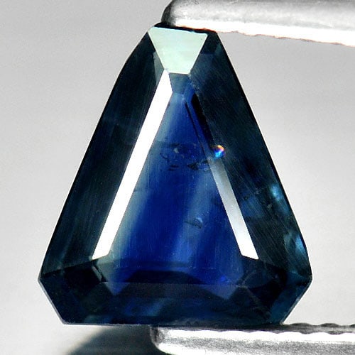 Natural Blue Sapphire Gemstones 1.89 Ct. Fancy Shape 8.9 x 8 Mm.: Product ID: 806008216 Product Name: Natural Blue Sapphire Weight: 1.89 CT. Size: 8.9 x 8 x 3.1 MM. Shape: Fancy Color: Blue Clarity:SI Luster: Good Gems Origin: Thailand Treatment: Heated Crystal Stru