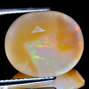 Natural Yellow Opal Gemstones 5.33 Ct. Oval Shape 14.2 x 12 Mm.: Product ID: 818711556 Product Name: Natural Opal Weight: 5.33 CT. Size: 14.2 x 12 x 6.9 MM. Shape: Oval Color: Yellow Clarity:Semi - Transparent Luster: Good Gems Origin: Ethiopia Treatment: Unheated 