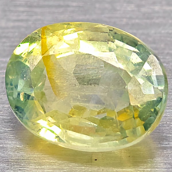Natural Greenish Yellow Sapphire Gemstones 0.96 Ct. Oval Shape 6.1 x 4.8 Mm. (1 of 3)