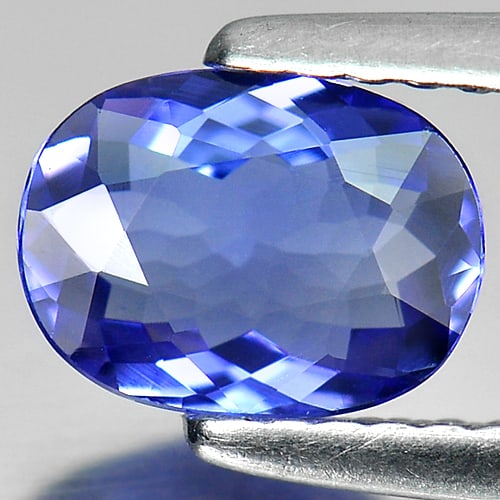 Natural Violetish Blue Tanzanite Gemstones 0.86 Ct. Oval Shape 7.57 x 5.64 Mm.: Product ID: 807005517 Product Name: Natural Tanzanite Weight: 0.86 CT. Size: 7.57 x 5.64 x 2.63 MM. Shape: Oval Color: Purple Clarity:IF Luster: Good Gems Origin: Tanzania Treatment: Heated Crystal St