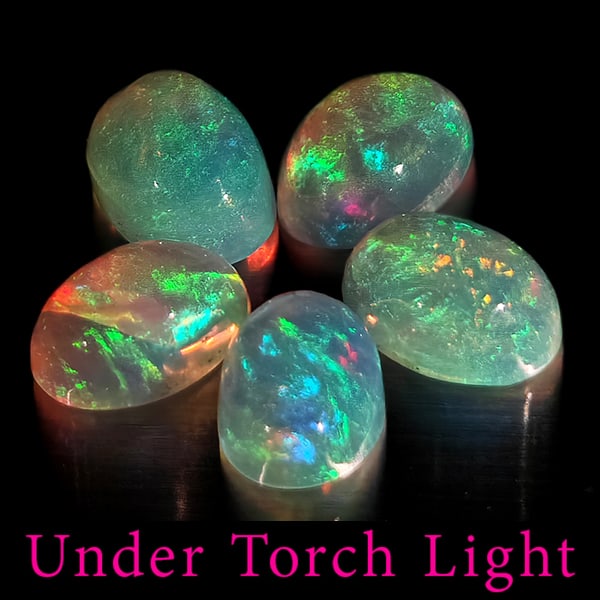 Natural Multi Color Opal Gemstones 1.80 Ct. 5 Pcs. Oval Shape Cabochon 6 x 4.2 Mm.: Product ID: 818728113 Product Name: Natural Opal Weight: 1.80 CT. Size: 6 x 4.2 x 2.8 MM. Shape: Oval Cabochon Color: Multi-Color Clarity:Semi - Transparent Luster: Good Gems Origin: Ethiopia Treatmen