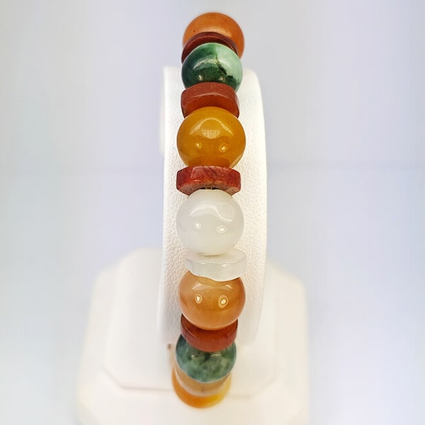 Natural Multi Color Genuine Jade Gemstones 176.04 Ct. Beads Stretch Bracelet: Product ID: 818102738 Product Name: Natural Jade Weight: 176.04 CT. Size: 2.5 x 11.4 MM. Shape: Mix Round Cabochon Color: Multi-Color Green Clarity:Opaque Luster: Good Gems Origin: Thailand Treatment: