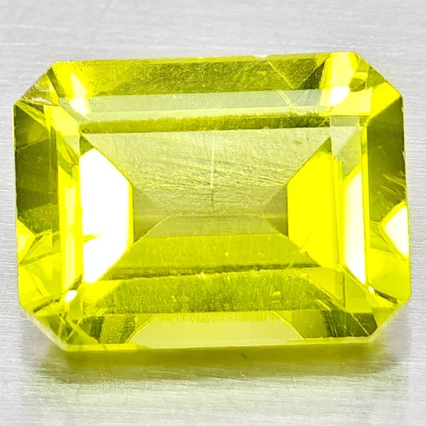 Natural Green Peridot Gemstones 1.62 Ct. Octagon Shape 7.9 x 5.9 Mm.: Product ID: 805317172 Product Name: Natural Peridot Weight: 1.62 CT. Size: 7.9 x 5.9 x 3.8 MM. Shape: Octagon Color: Green Clarity:VSI - SI1 Luster: Good Gems Origin: Pakistan Treatment: Unheated Crys