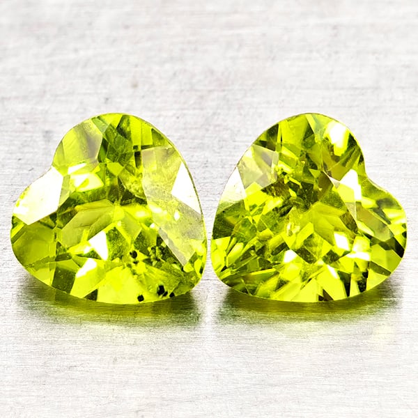 Natural Green Peridot Gemstones 1.79 Ct. 2 Pcs. Heart Shape 6.1 x 6 Mm.: Product ID: 805317287 Product Name: Natural Peridot Weight: 1.79 CT. Size: 6.1 x 6 x 4 MM. Shape: Heart Shape Color: Green Clarity:VSI - SI1 Luster: Good Gems Origin: Pakistan Treatment: Unheated Crys