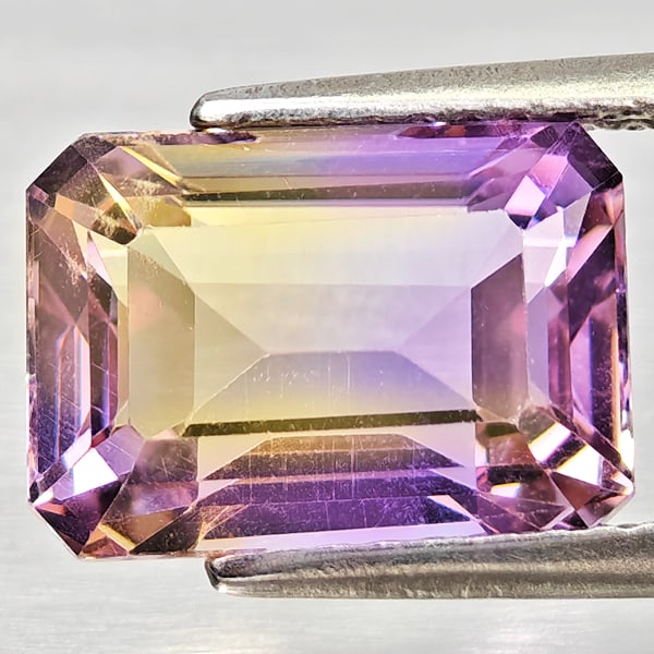 Natural Bi Color Ametrine Gemstones 3.73 Ct. Octagon Shape 10.8 x 7.7 Mm.: Product ID: 800408372 Product Name: Natural Ametrine Weight: 3.73 CT. Size: 10.8 x 7.7 x 6.1 MM. Shape: Octagon Color: Bi Color Clarity:VSI Luster: Good Gems Origin: Bolivia Treatment: Unheated Crysta